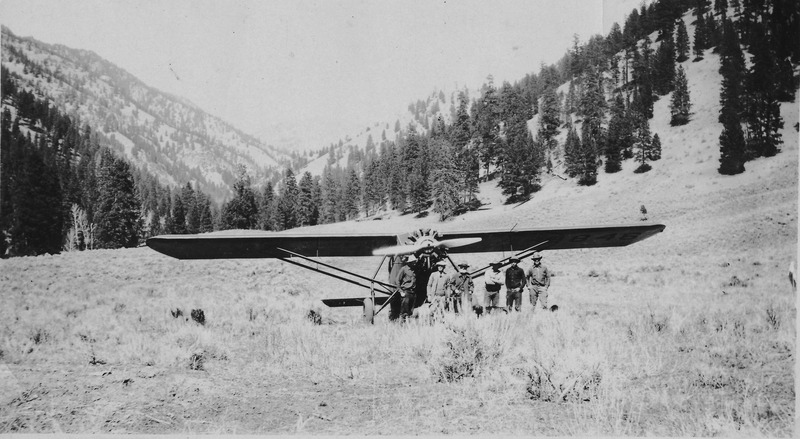 item thumbnail for Noel Routson, Dave Lewis and others with the first airplane that flew out of the upper airstrip at Cabin Creek