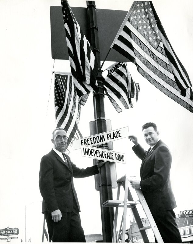 item thumbnail for Mayor Handel Putting Up Flags