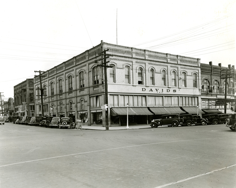 item thumbnail for Davids' department store exterior showing streets and parked cars.