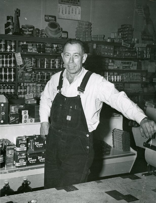 item thumbnail for Grocery store interior and unknown man posing