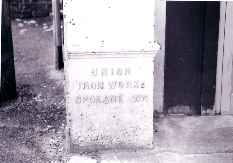 item thumbnail for Pillar base with sign "Union Iron Works, Spokane, WA"