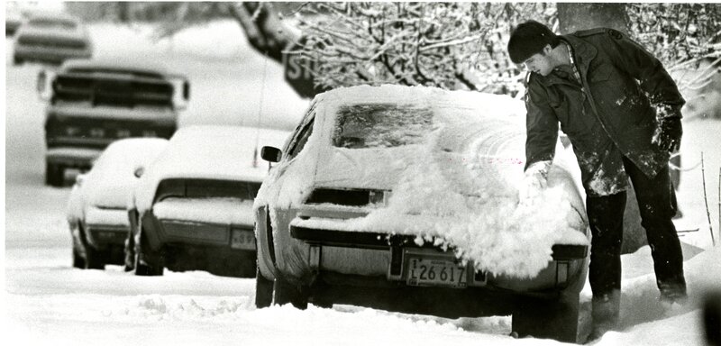 item thumbnail for Clearing a Snow Covered Car