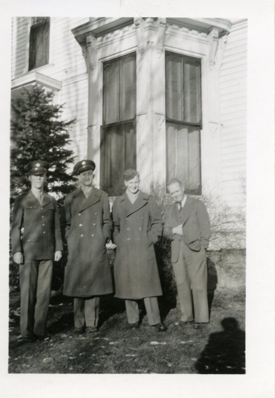 item thumbnail for four men on the McConnell Mansion lawn